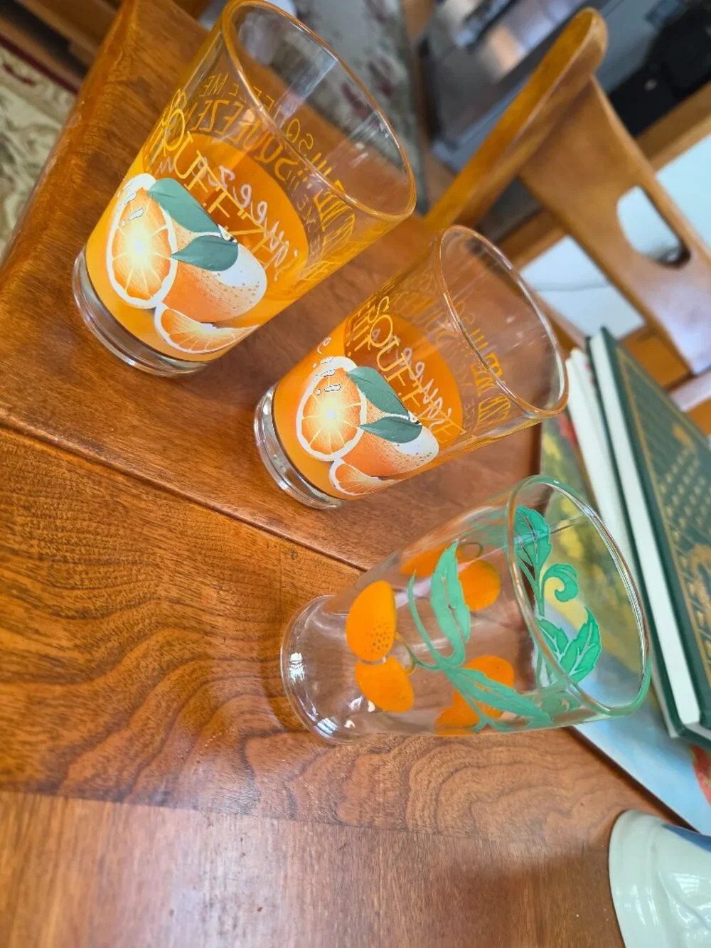 set of two crate and barrel squeeze orange juice glasses and one vintage